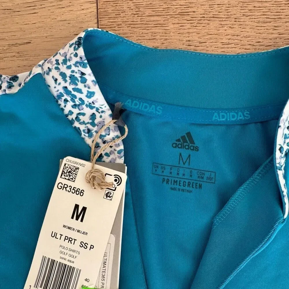 $60 adidas printed polo size medium m10